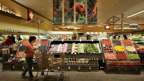 LIVERMORE, CA - JULY 18:  A Safeway customer browses in the fruit and vegetable section at Safeway's new "Lifestyle" store July 18, 2007 in Livermore, California. Safeway unveiled its newest Lifestyle store that features numerous organic and natural foods as well as expanded produce, meat, seafood and floral departments. The store also offers freshly made desserts and baked goods, a coffee roaster, a fresh nut bar and wine section with over 2,000 wines, some of which are stored in a climate controlled wine cellar.  (Photo by Justin Sullivan/Getty Images)