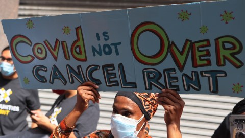 NEW YORK, NEW YORK - AUGUST 31: People hold up a signs as they gather outside of a New York City Marshall's office calling for a stop to evictions on August 31, 2021 in New York City. Housing activists and community members gathered and marched towards the NYC office of Gov. Hochul calling on her, Assembly Speaker Carl Heastie, and Senate Majority Leader Andrea Stewart-Cousins to amend and extend the evictions moratorium, which expires tonight. Rent Stabilization Association, New York's largest landlord group, has threatened to sue the state legislature if lawmakers extend the pandemic-era eviction moratorium. On August 12th, the U.S. Supreme Court ruled against parts of New York's eviction moratorium that allows renters to submit a hardship declaration form stating a loss of income due to the coronavirus (COVID-19) pandemic or that moving would harm their health. (Photo by Michael M. Santiago/Getty Images)