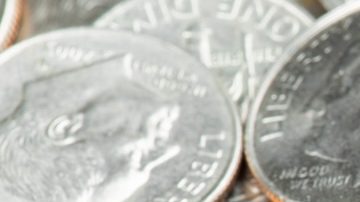 Monedas de 10 centavos de dólar estadounidense.