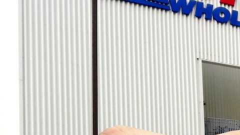 Tarjeta de membresía, Costco como fondo.