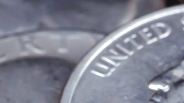 Moneda de 25 centavos de Estados Unidos.