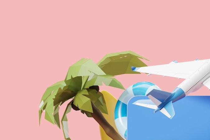 Tarjeta de crédito bancaria azul y diferentes iconos de viaje sobre fondo rosa.