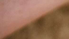 Moneda de 50 centavos y mano.