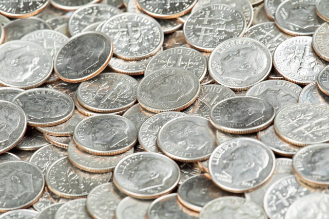 Antecedentes de monedas de diez centavos de Estados Unidos de cerca.