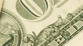 Montón de billetes de $1 dólar estadounidense.