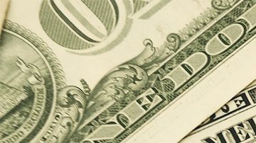 Montón de billetes de $1 dólar estadounidense.