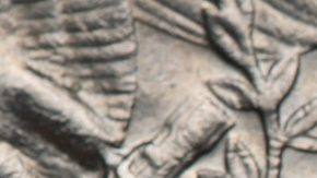 Sacagawea con su hijo en el dólar estadounidense de Sacagawea.