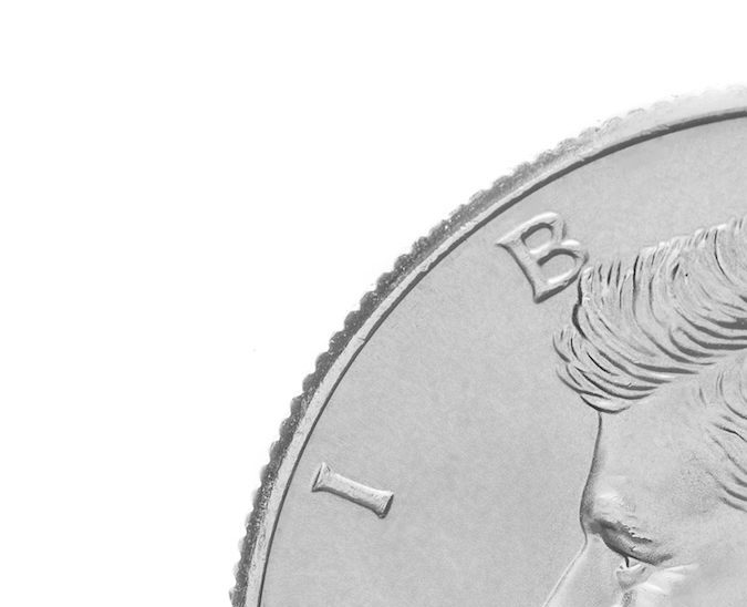 Las monedas de 50 centavos de 2014 de edición especial, están compuestas de 75% cobre y 25% níquel sobre un centro de cobre puro.